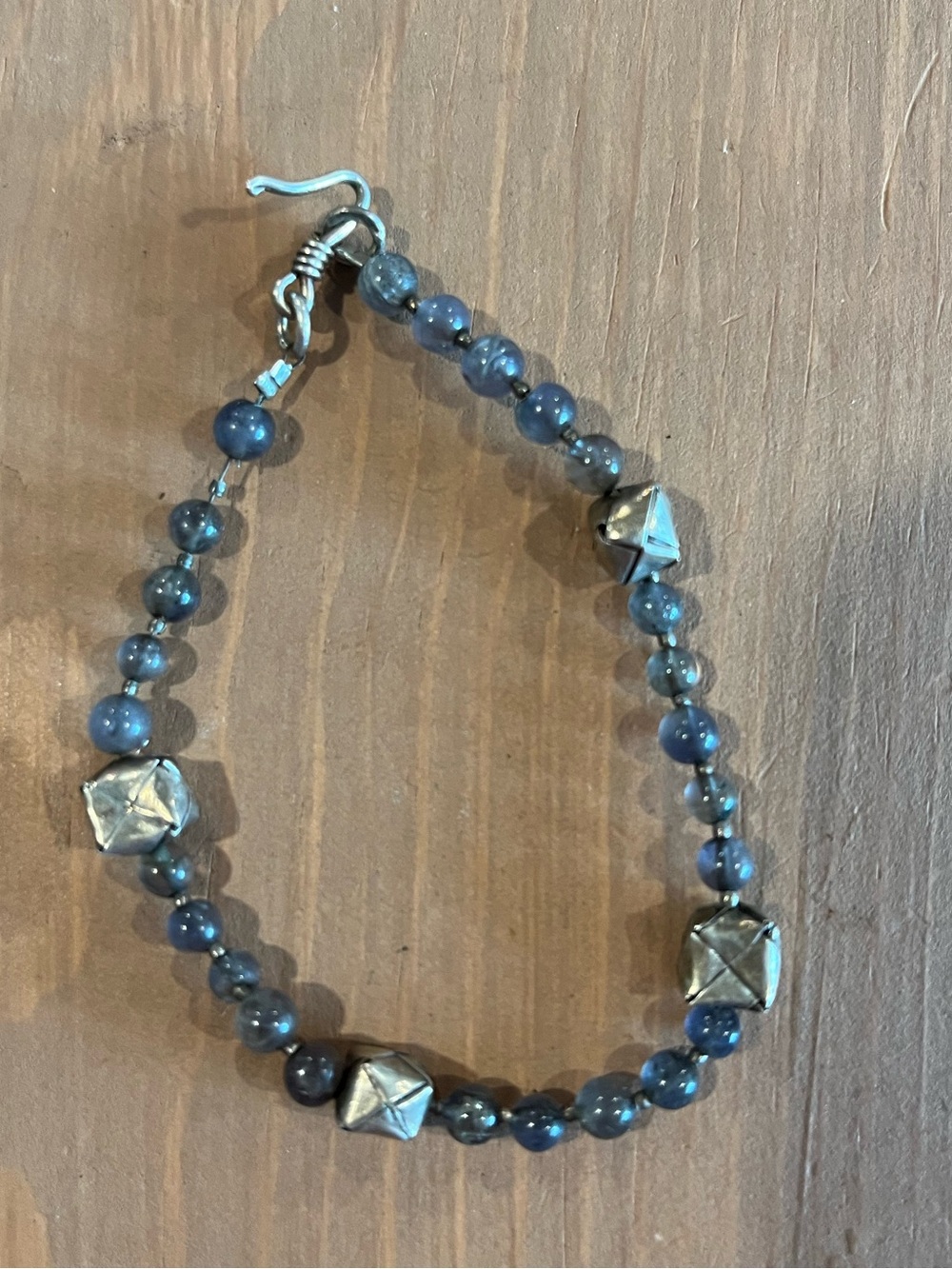 Handmade bracelet with handmade 925 clasp. Silver boxes strung on cord. See pics